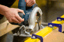 The circular saw being used on the safe use of hand power tools course