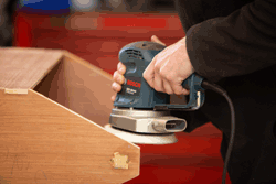 The sander being used on the safe use of hand power tools course