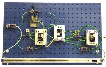 This is one of the modular assembly boards which candidates use to interconnect pneumatic components in the practical exercises to form various useful systems on the Pneumatic training course